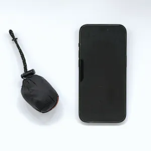 iPhone 14 Pro と比較した NANGA ポケッタブルエコバッグのサイズ