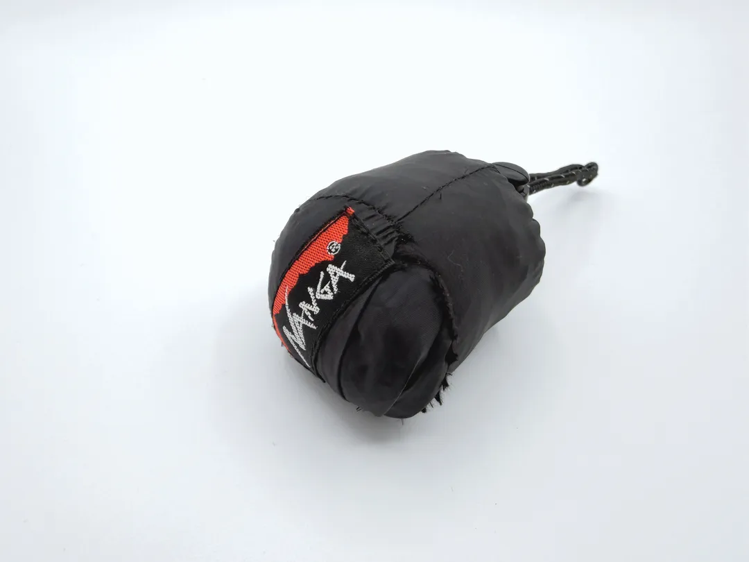 収納袋の縫い目から割けてしまった NANGA のポケッタブルエコバッグ